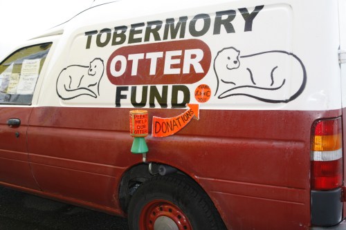 New coin slots cut into both sides of the TOF van allow donations to be taken 24/7.